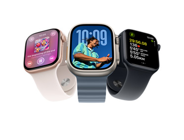 Three Apple Watch devices: Apple Watch Series 11, rose gold color, aluminium case, Apple Music, playlist controls, right side exterior, Digital Crown, light blush colour Sport Band, silver pin-and-tuck closure, Apple Watch Ultra 3, natural colour, titanium case, edge-to-edge display, photo overlaid on time, right side exterior, Digital Crown, anchor blue colour Ocean Band, tubular fluoroelastomer rubber, Apple Watch SE 3, aluminium case, midnight colour, right side exterior, Digital Crown, advanced Outdoor Run workout metrics