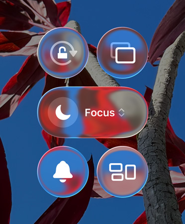 Colourful iPhone home screen with transparent Liquid Glass apps and widgets